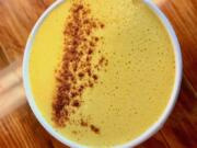 The turmeric latte from Relevant Coffee features creamy coconut and a gingery turmeric flavor that makes for a highly addictive vegan drink.