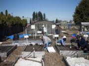 The Hazel Dell School and Community Garden used to be a mess before several different groups signed on to maintain it. In the summer, the school supplies a drip irrigation system that makes watering easier.