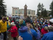 Heather Freitag of Vancouver, facing, embraces her daughter, Matthea Freitag, 12, after the March For Our Lives rally at Esther Short Park on Saturday afternoon. Matthea Freitag, one of the students who spoke to crowd, shared what it is like to live with the threat of a shooting at her school. About 1,000 people attended the marches and rally.