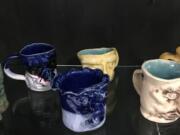 Ridgefield: Mugs made by art students in Ridgefield High School, which were inspired by African face jugs brought to America through the slave trade. The project was part of a district-wide Black History Month focus.