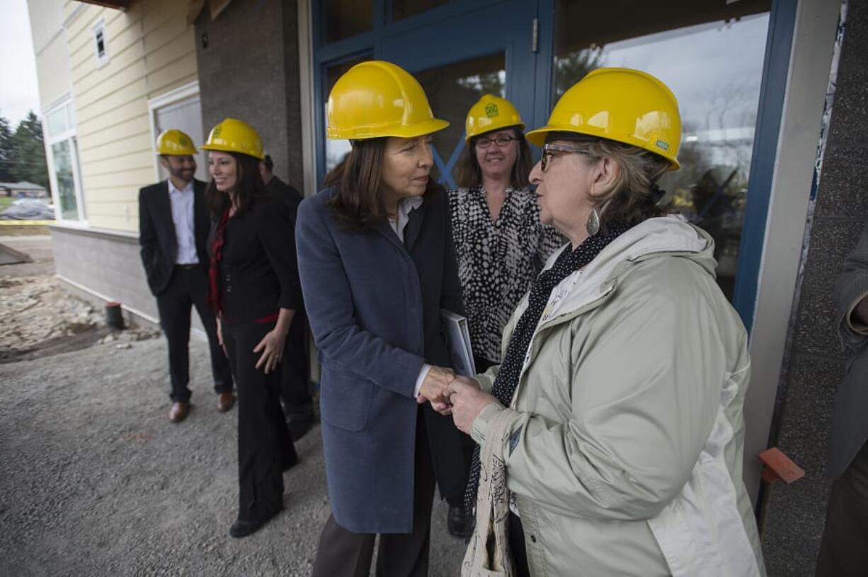 U.S. Sen. Maria Cantwell, D-Wash., left, talks with Pat Jonak, a resident of Vista Court Senior Estates for low-income seniors. The two women, as well as other state and local low-income housing advocates, spoke on the topic of affordable housing.