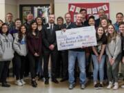 Camas: Union High School teacher Don Rasmussen was presented with a check during his fourth-period Advanced Placement psychology class. A student in that class nominated him for the Evergreen School District Foundation’s Educator of the Year award.