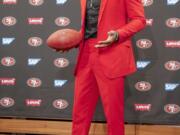 San Francisco 49ers new cornerback Richard Sherman poses for a photo after answering questions during an NFL football news conference in Santa Clara, Calif., Tuesday, March 20, 2018. Sherman agreed to a three-year deal with the 49ers.