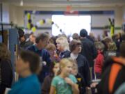 Young and old pack the halls at Battle Ground High School in January 2009 to help Battle Ground Public Schools celebrate its 100th birthday. A school district cannot, under state law, divide and reorganize into multiple separate districts.