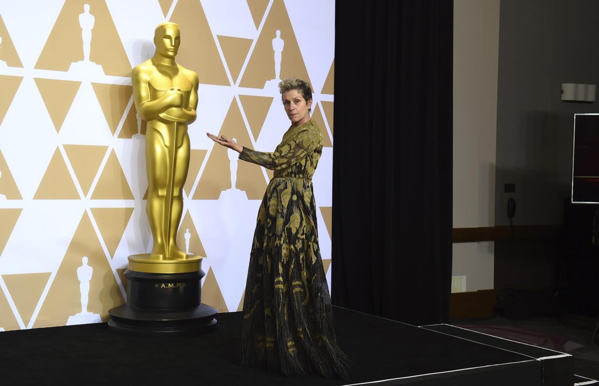 Frances McDormand, winner of the award for best performance by an actress in a leading role for "Three Billboards Outside Ebbing, Missouri", poses in the press room at the Oscars on Sunday, March 4, 2018, at the Dolby Theatre in Los Angeles.