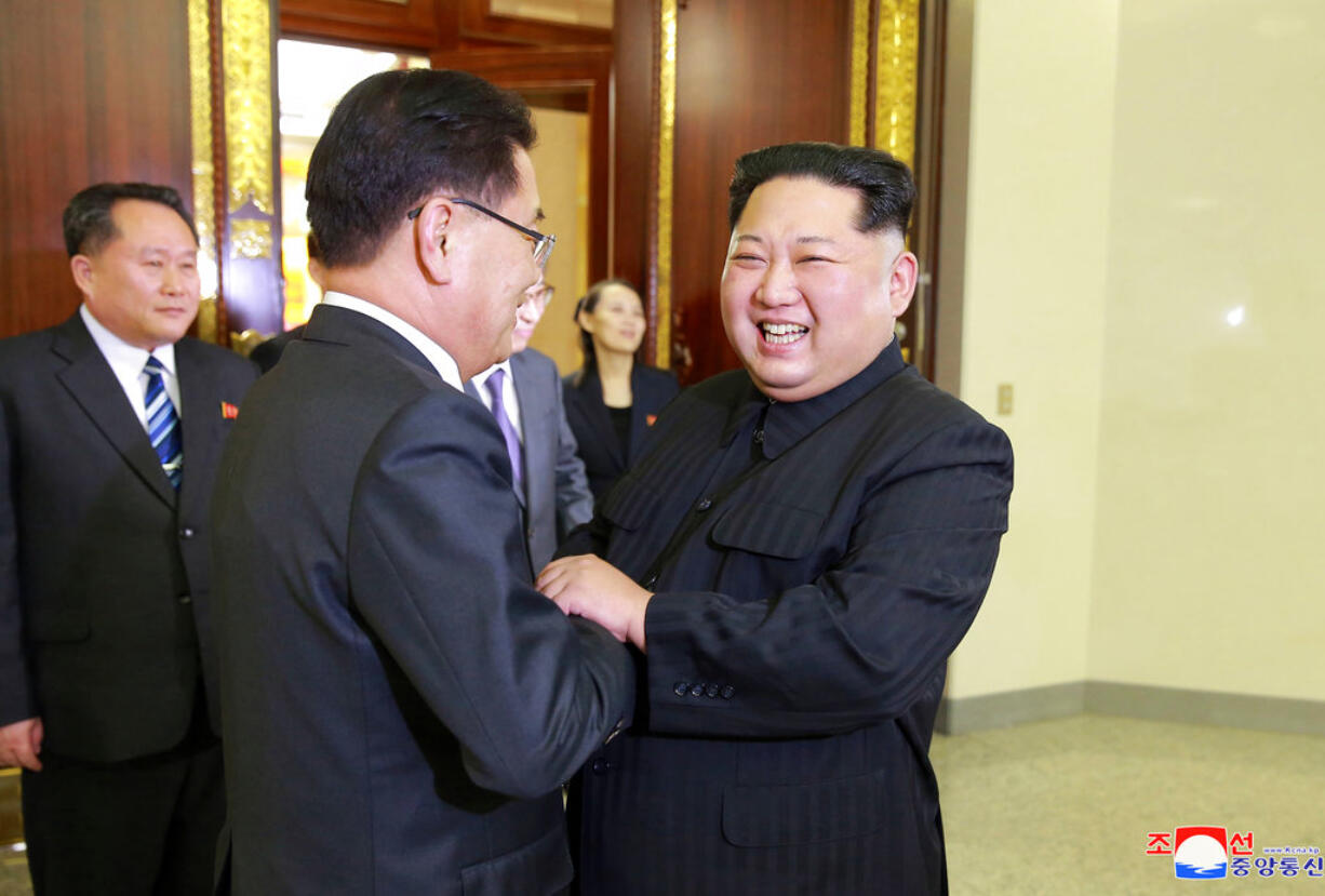 In this Monday, March 5, 2018 photo, provided by the North Korean government on March 6, North Korean leader Kim Jong Un, front right, meets South Korean National Security Director Chung Eui-yong, front left, in Pyongyang, North Korea. Independent journalists were not given access to cover the event depicted in this image distributed by the North Korean government. The content of this image is as provided and cannot be independently verified. Korean language watermark on image as provided by source reads: "KCNA" which is the abbreviation for Korean Central News Agency.