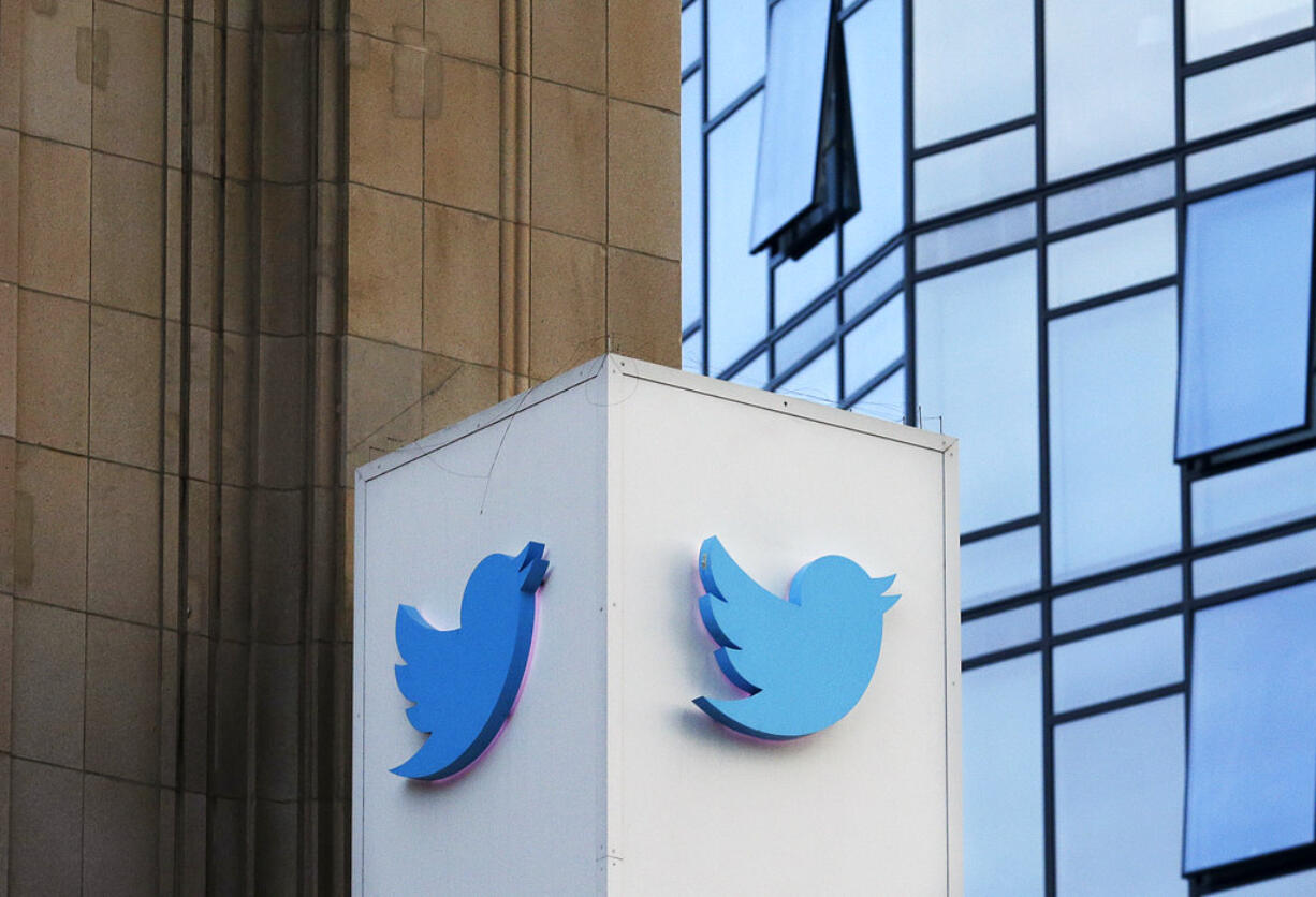 FILE - This Oct. 26, 2016 file photo shows a Twitter sign outside of the company's headquarters in San Francisco. A new study published Thursday, March 8, 2018, in the journal Science shows that false information on the social media network travels six times faster than the truth and reaches far more people.