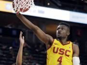 Southern California's Chimezie Metu (4) shoots during the first half of the team's NCAA college basketball game against Oregon State in the quarterfinals of the Pac-12 men's tournament Thursday, March 8, 2018, in Las Vegas.