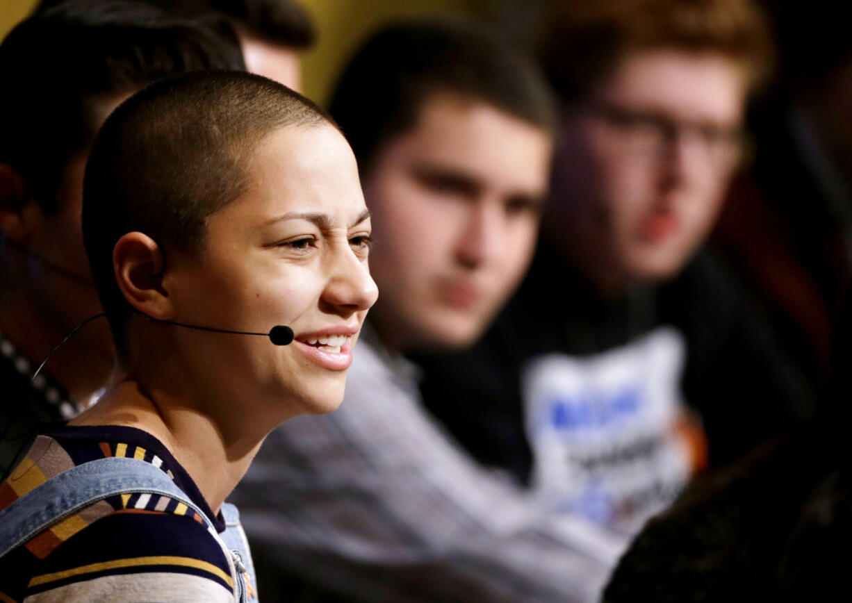 Marjory Stoneman Douglas High School students, front the left, Emma Gonzalez, Alex Wind, and Matt Deitsch participate in a panel discussion about guns, Tuesday, March 20, 2018, at Harvard Kennedy School's Institute of Politics, in Cambridge, Mass. The Feb. 14, 2018 attack in Florida killed 17 people, 14 of them students. The students have become vocal advocates for stricter gun laws.