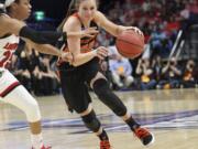 Oregon State's Kat Tudor, right, drives on Louisville's Asia Durr during the first half of an NCAA women's college basketball tournament regional final, Sunday, March 25, 2018, in Lexington, Ky.