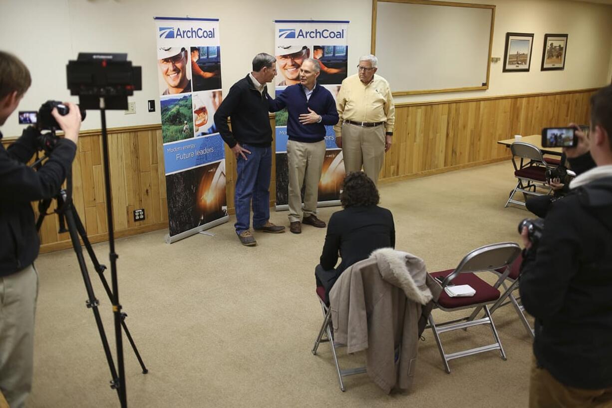 Sen. John Barrasso, EPA Administrator Scott Pruitt and Sen. Mike Enzi talk to the press after a tour of the Black Thunder Coal Mine outside of Wright, Wyo., Thursday, Mar. 29, 2018.