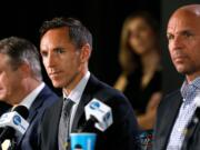 Former NBA player Steve Nash, center, speaks as former NBA player Jason Kidd, right, looks on during a news conference for the Naismith Memorial Basketball Hall of Fame class of 2018 announcement, Saturday, March 31, 2018, in San Antonio.