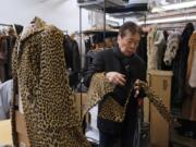 Benjamin Lin looks over a 60-year-old cheetah jacket he is restoring at the B.B. Hawk showroom in San Francisco. San Francisco could become the largest U.S. city to ban the sale of fur items, a move that would hearten animal lovers but frustrate niche business owners who say they’re fed up with a city that dictates what retailers can or can’t sell. If the ban is approved by the Board of Supervisors on Tuesday, March 20, 2018, San Francisco would join two other California cities, West Hollywood and Berkeley, in saying no to a symbol of glamour that animal advocates say is built on cruelty and doesn’t reflect the city’s values.