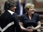 Then Senate Majority Leader Lisa Brown, right, D-Spokane, laughs with Sen. Tracey Eide, D-Federal Way, at the state Capitol on April 11, 2012, in Olympia after the Washington state Legislature adjourned. Brown is running against incumbent Republican Rep. Cathy McMorris Rodgers for the House seat representing the Spokane area.