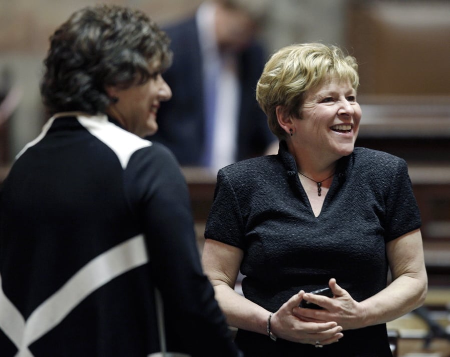 Then Senate Majority Leader Lisa Brown, right, D-Spokane, laughs with Sen. Tracey Eide, D-Federal Way, at the state Capitol on April 11, 2012, in Olympia after the Washington state Legislature adjourned. Brown is running against incumbent Republican Rep. Cathy McMorris Rodgers for the House seat representing the Spokane area.