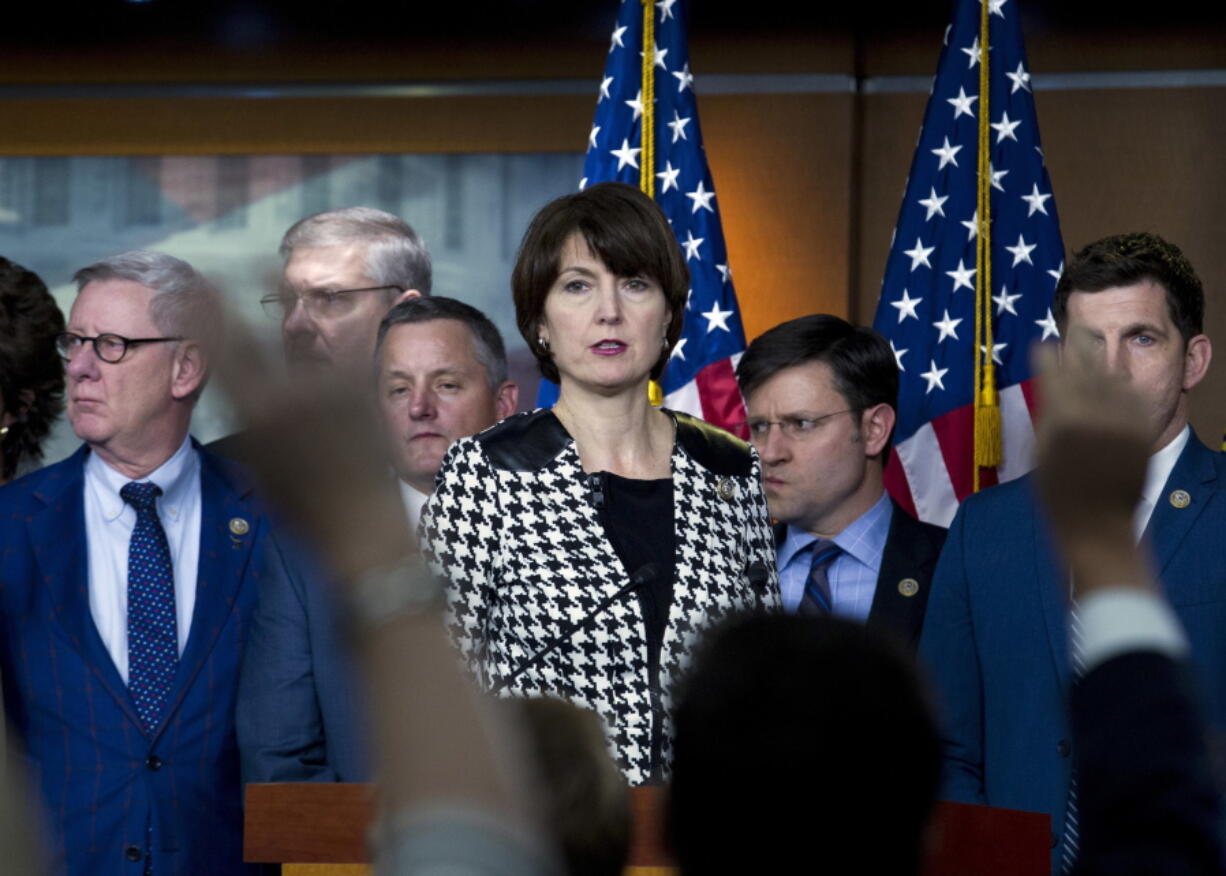 Rep. Cathy McMorris Rodgers, R-Wash., accompanied by other members of Congress, speaks during a news conference Jan. 20 on Capitol Hill in Washington. McMorris Rodgers has steadily risen in leadership roles in the U.S. House while easily winning seven elections in conservative Eastern Washington. But facing a serious challenge from a popular Democrat, the GOP is pouring money and resources this year into a 5th Congressional District contest the party had been able to ignore for 20 years.