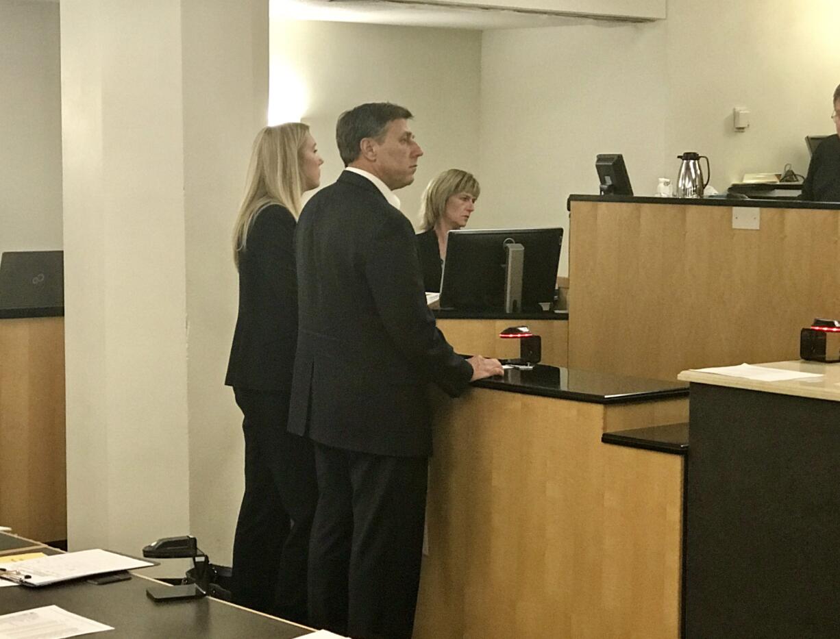 Jonathan Sall, an investigator with the U.S. Coast Guard, enters not-guilty pleas Friday in Clark County Superior Court to second-degree rape and indecent liberties without forcible compulsion. Sall is accused of raping a co-worker's girlfriend at the couple's Hazel Dell residence.