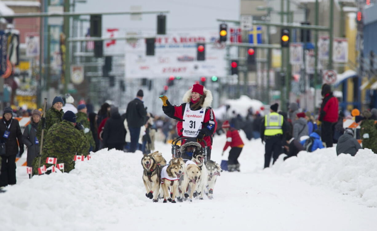 Musher Aliy Zirkle runs her team during the ceremonial start of the Iditarod Trail Sled Dog Race, Saturday, March 3, 2018, in Anchorage, Alaska. Zirkle has finished as high as second in the race.