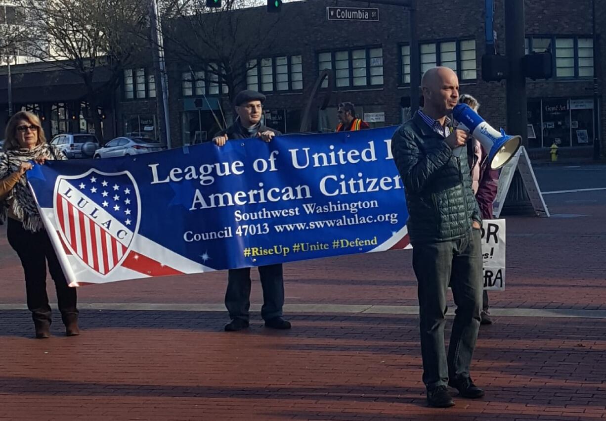 Demonstrators take part in a march Saturday in support of the Dream Act. Dozens of marchers walked from the office of Rep. Jamie Herrera Beutler to Esther Short Park.