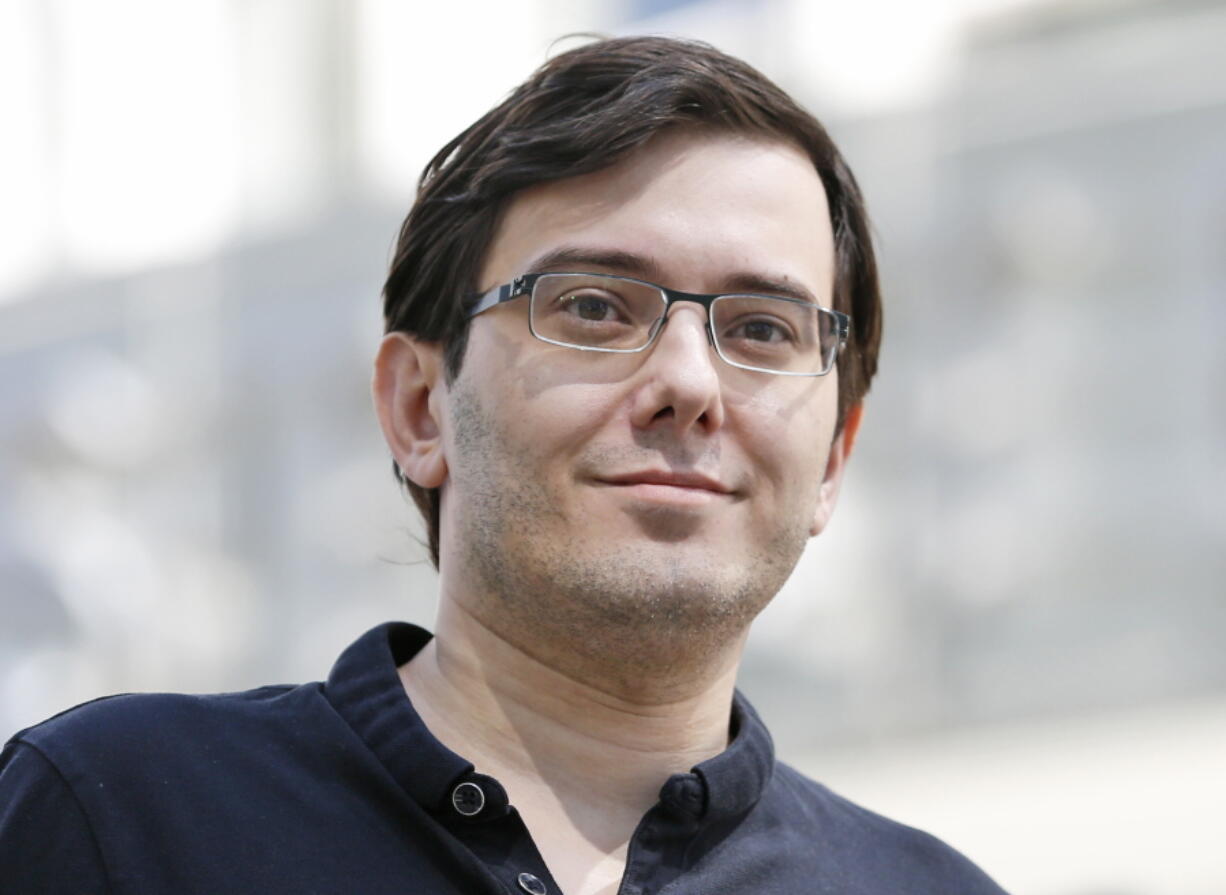 Martin Shkreli talks with reporters Aug. 4 after leaving federal court in New York. Shkreli was sentenced to seven years in prison for securities fraud last week. He owns two collectible rap albums by Wu-Tang Clan and Lil Wayne that could be auctioned by the government since he has to forfeit more than $7.3 million in a brokerage account and personal assets.