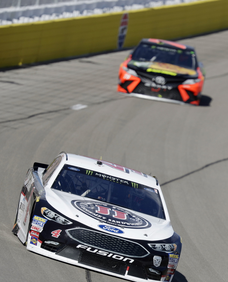 Kevin Harvick lead drivers during a NASCAR Cup series auto race Sunday, March 4, 2018, in Las Vegas.