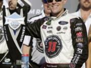 Monster Energy NASCAR Cup Series driver Kevin Harvick (4) holds up three fingers after winning his third race this season during the NASCAR Cup Series on Sunday, March 11, 2018, in Avondale, Ariz.