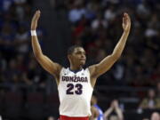 FILE - In this March 6, 2018 file photo Gonzaga’s Zach Norvell Jr. raises his hands to the crowd during the first half of the West Coast Conference tournament championship NCAA college basketball game against BYU in Las Vegas. Norvell is providing Gonzaga with fiery spark on the way to the Sweet 16. Norvell hit tiebreaking 3-pointer in NCAA Tournament opening round and scored 28 points in second round.