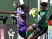 Goalie Adrianna Franch, right, and the defending champion Portland Thorns open the sixth NWSL season against the North Carolina Courage on Saturday. Both teams looking to build on last year’s success.