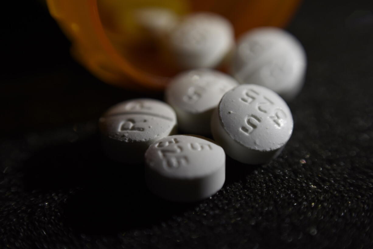 An arrangement of pills of the opioid oxycodone-acetaminophen in New York. The American Dental Association on Monday said it is pressing for seven-day prescription limits and mandatory education that encourages using other painkillers.