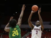 Washington State forward Robert Franks (3) shoots over Oregon forward Abu Kigab (24) during the second half of an NCAA college basketball game in Pullman, Wash., Thursday, March 1, 2018.