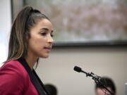 Olympic gold medalist Aly Raisman is suing the U.S. Olympic Committee and USA Gymnastics, claiming both organizations “knew or should have known” about abusive patterns by a disgraced former national team doctor now in prison for sexually abusing young athletes. Raisman filed the lawsuit in California on Wednesday, Feb. 28, 2018. (Dale G.