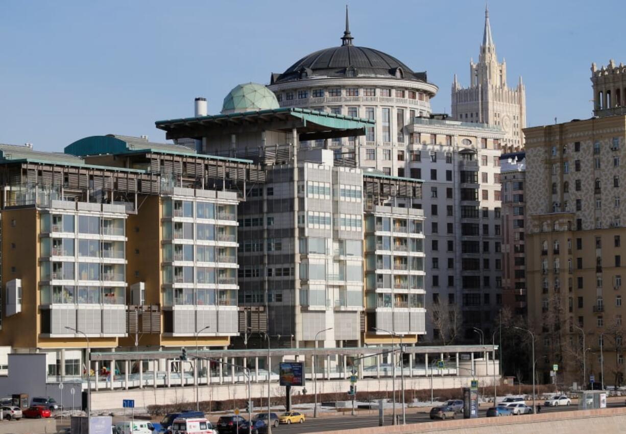 The British Embassy building, foreground, with the Russian Foreign Ministry building, background right, in Moscow, Russia, on Friday. The Russian Foreign Ministry said Friday it has ordered Britain to reduce the number of its diplomats in Moscow to the level that Russia has in London, escalating a diplomatic war with the West over the poisoning of an ex-Russian spy in Britain.