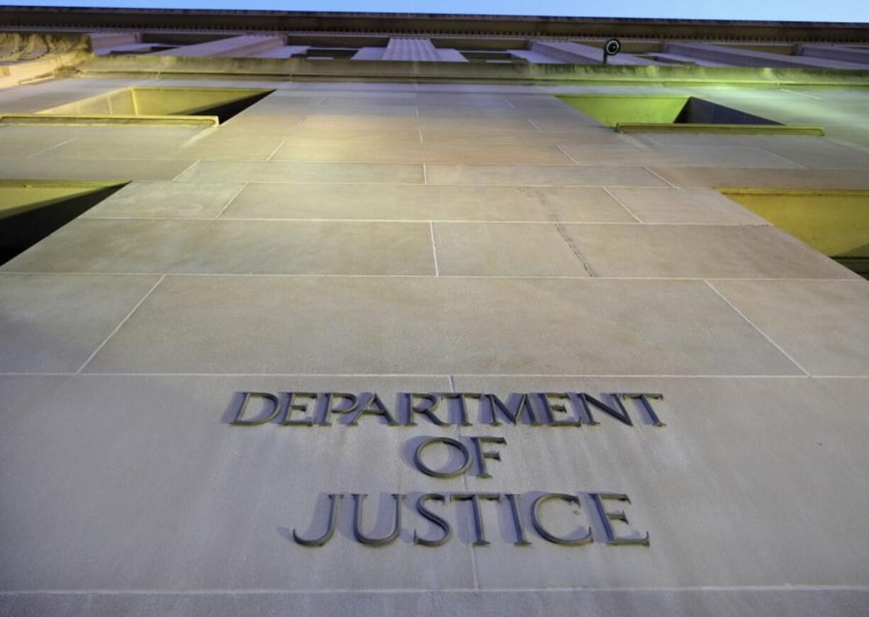 The Department of Justice headquarters building in Washington is photographed early in the morning. The federal government censored, withheld or said it couldn’t find records sought by citizens, journalists and others more often last year than at any point in the past decade, according to an Associated Press analysis of new data. The highest number of requests went to the departments of Homeland Security, Justice, Defense, Health and Human Services, and Agriculture, along with the National Archives and Records Administration and Veterans Administration. (AP Photo/J.