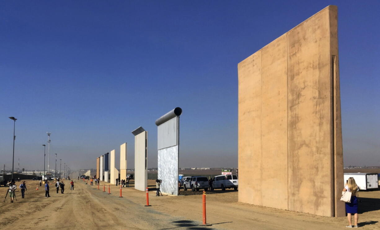 Prototypes of border walls are displayed Oct. 26 in San Diego. President Donald Trump is heading to California on Tuesday in his first visit to the state he loves to hate since becoming president.