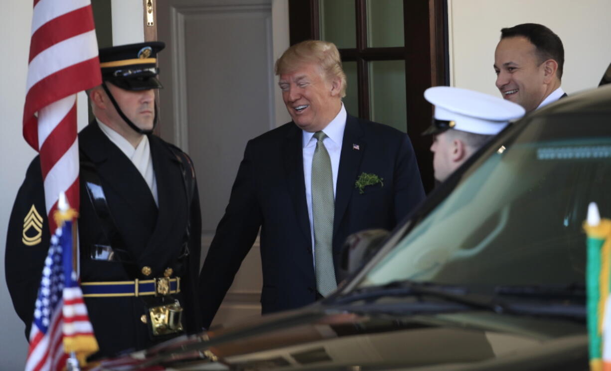 President Donald Trump welcomes Prime Minister Leo Varadkar of Ireland, upon arrival at the White House on Thursday in Washington.