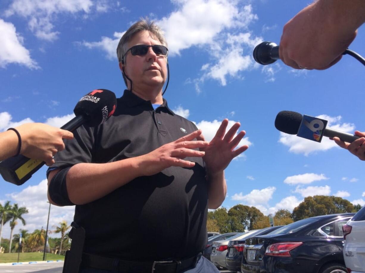 Joe Smitha of Palm Harbor, Fla., speaks with reporters on Saturday, March 17, 2018, about his niece, Alexa Duran, whose family has identified her as one of at least six victims of a bridge collapse near the Florida International University campus in the Miami area on March 15.