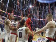 Gonzaga celebrates after winning the West Coast Conference tournament championship NCAA college basketball game against BYU Tuesday, March 6, 2018, in Las Vegas. Gonzaga defeated BYU 74-54.