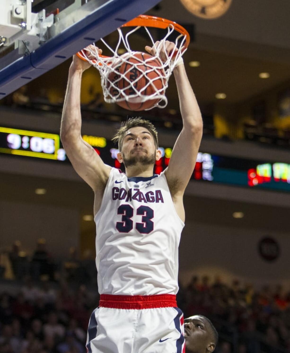 Gonzaga’s Killian Tillie (33) dunks against Loyola Marymount during the second half of an NCAA college basketball game in the quarterfinals of the West Coast Conference tournament, Saturday, March 3, 2018, in Las Vegas. (AP Photo/L.E.