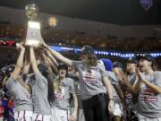 Gonzaga celebrates after winning the West Coast Conference tournament championship NCAA women's college basketball game against San Diego Tuesday, March 6, 2018, in Las Vegas. Gonzaga defeated San Diego 79-71.