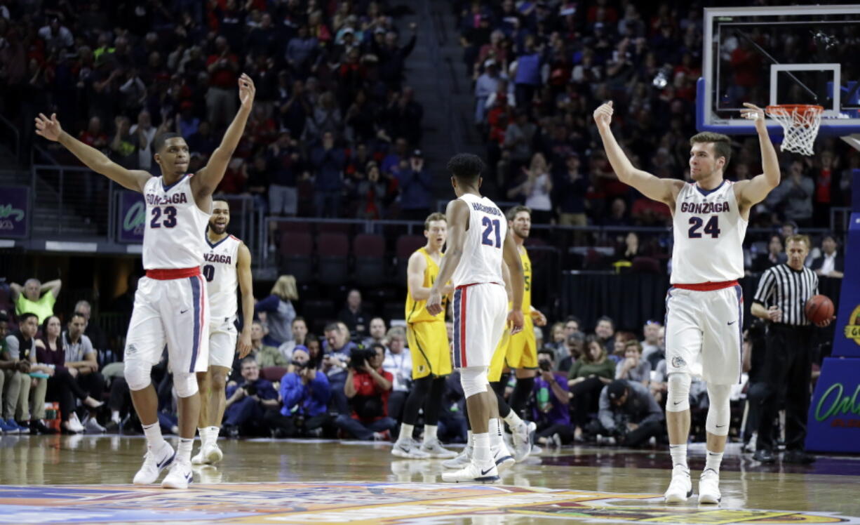 Gonzaga’s Zach Norvell Jr. (23) and Corey Kispert (24) react after scoring during the first half of a West Coast Conference tournament NCAA college basketball game against San Francisco Monday, March 5, 2018, in Las Vegas.