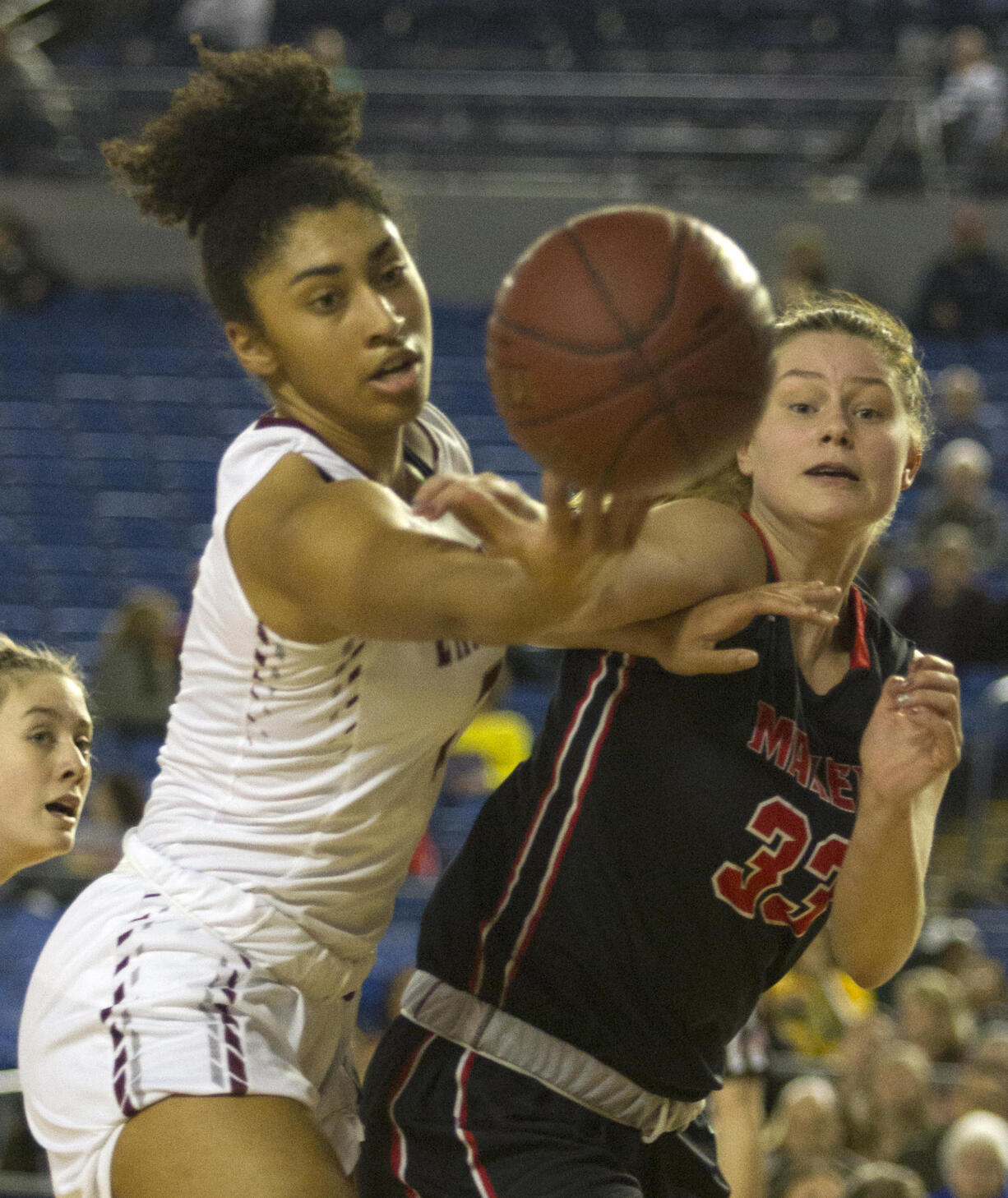 Camas's Courtney Clemmer (33) has a rebound knocked. away byEastlake's  Mae Bryant (2) during a WIAA 4A State Hardwood Classic's 2nd round basketball game at the Tacoma Dome on March 1, 2018 in Tacoma. Eastlake led Camas 27-6 at the half and went onto win 58-27.