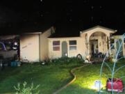 A garage fire Saturday night displaced three residents of an east Vancouver home near the 4000 block of Northeast 141st Avenue.