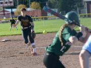 Prairie relief pitcher Olivia Meyers (26) follows through on a pitch during the Falcons' 19-10 win over Evergreen on Thursday, April 19, 2018 (Andy Buhler/ Columbian staff).