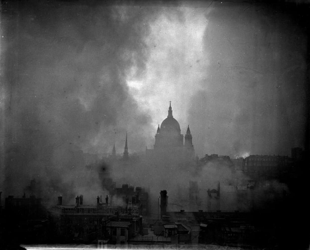 A photo taken in London shows the dome of St. Paul’s Cathedral silhouetted against the flame-lit sky after another German bombing raid in 1941 during World War II.