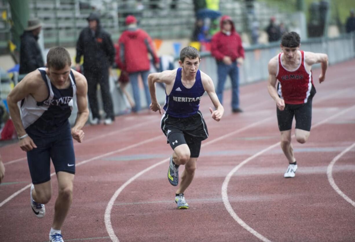 Heritage’s Ryan Cibart, left, competing at last season’s district meet, has become one of the area’s top middle distance runners in only his junior season.