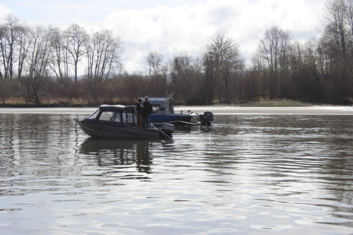 Anglers fishing for spring Chinook try their luck on the lower Columbia River. Fishing continues to be slow as the season winds down.