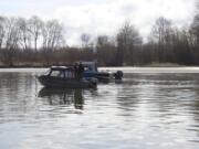 Anglers fishing for spring Chinook try their luck on the lower Columbia River. Fishing continues to be slow as the season winds down.