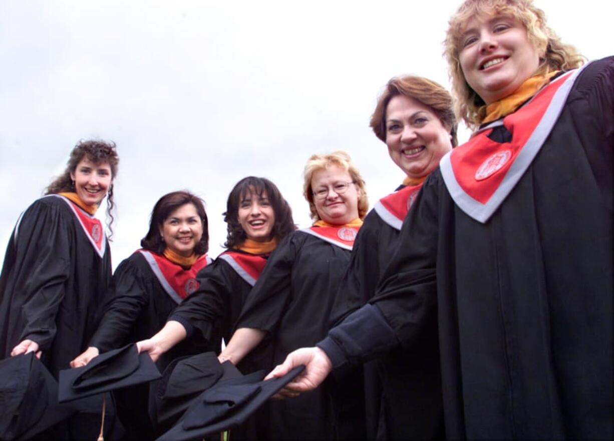 Deana Dahl, from left, Gloria Redmond, Diane Nelson, Janice Sherer, Christine Gauf and Debbie Gale celebrate in May 1999 as the first six graduates from Washington State University Vancouver with a Master in Nursing degree.