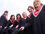 Deana Dahl, from left, Gloria Redmond, Diane Nelson, Janice Sherer, Christine Gauf and Debbie Gale celebrate in May 1999 as the first six graduates from Washington State University Vancouver with a Master in Nursing degree.