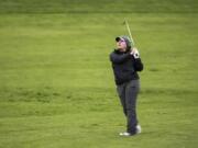 Washougal’s Kallie Sakamoto watches her hit on the 8th hole during the Chieftain Invitational at Tri-Mountain Golf Course in Ridgefield on Thursday April 12, 2018.